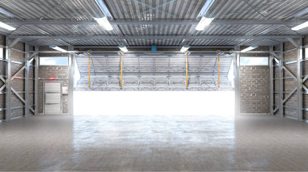 Installed bi-fold hangar door opening in a modern hangar space