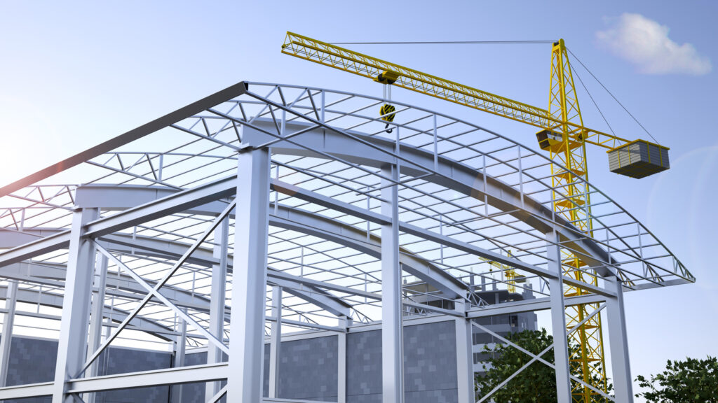 Construction of a steel frame building with a crane