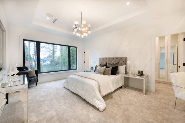 Bright and stylish master suite addition with chic decor