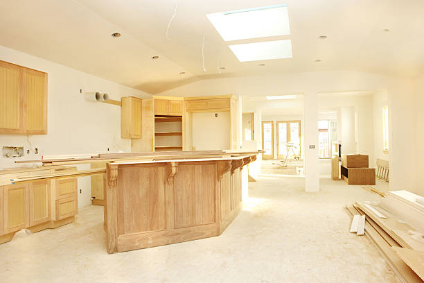 Kitchen addition construction with cabinetry and unfinished layout