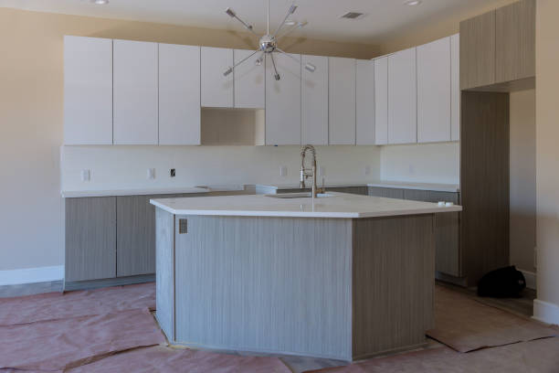 Newly remodeled kitchen featuring sleek cabinets and center island