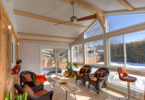 Newly constructed sunroom with a stylish and cozy interior design