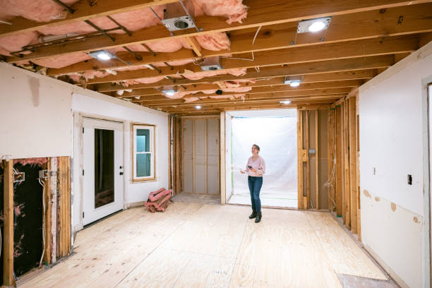 Master Suite Addition under construction with exposed beams and insulation