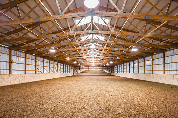 Completed post frame pole barn with spacious interior and natural light