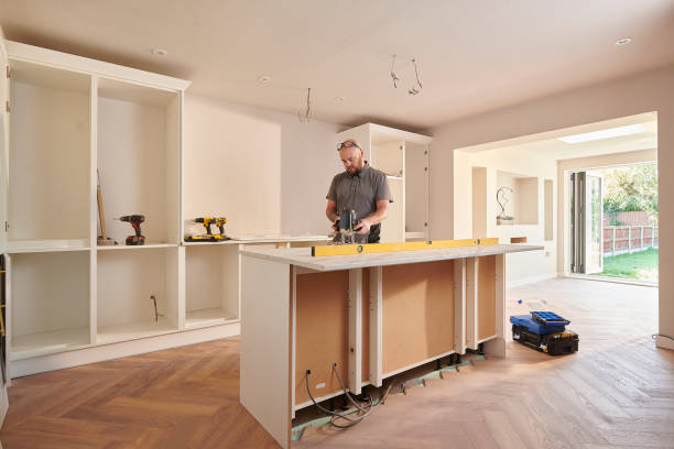 Kitchen remodeling contractor working on custom cabinetry installation