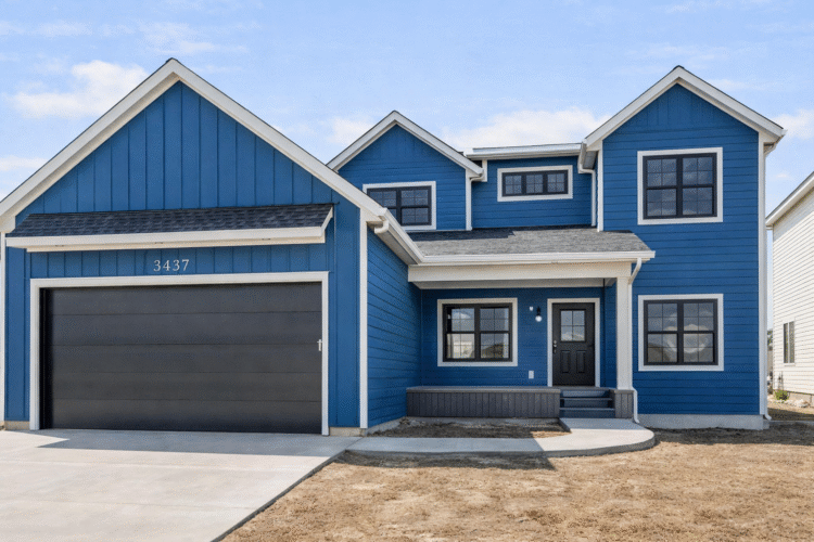 Custom home with attached shop and garage exterior