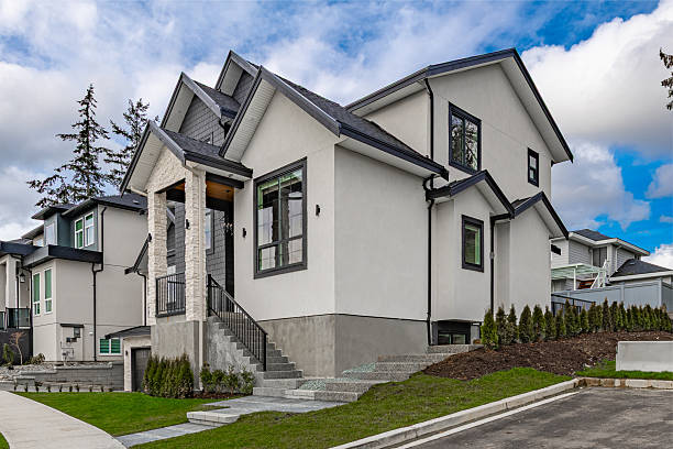 Finished modern spec home with white walls and large front windows